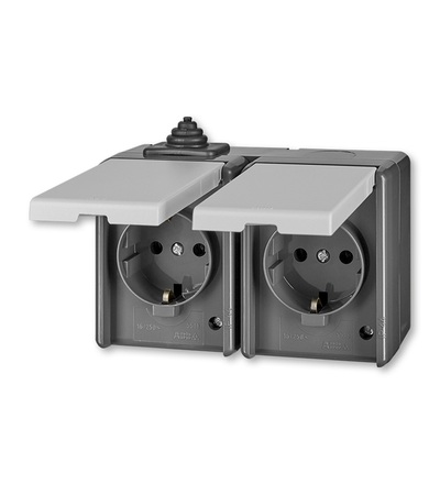 ABB Zásuvka dvojnásobná IP44, s ochr. kontakty (podle DIN), s víčky 5518-3029 S