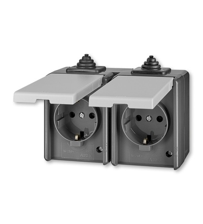 ABB Zásuvka dvojnásobná IP44, s ochr. kontakty (podle DIN), s víčky 5518-3069 S